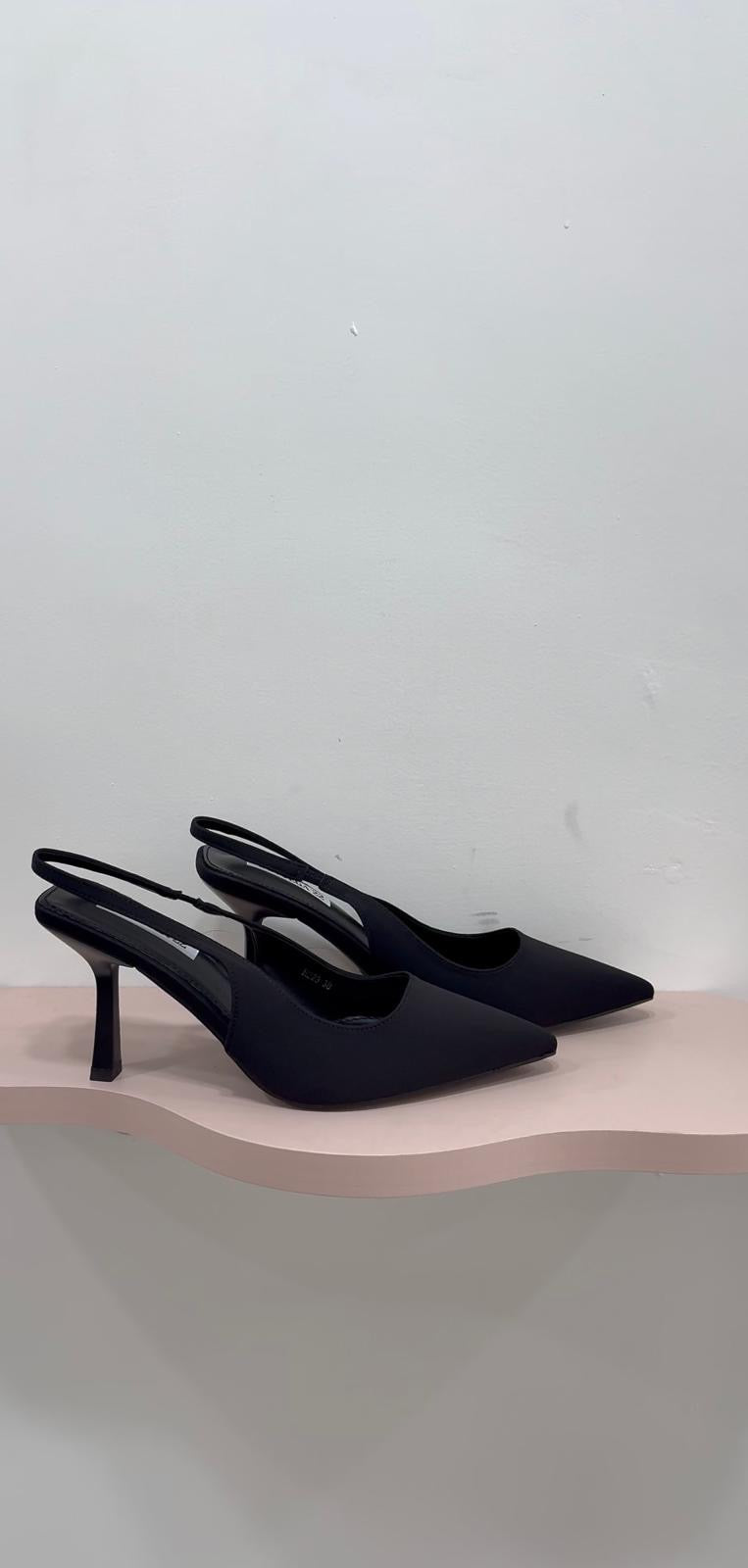 DÉCOLLETÉ BLACK MUST HAVE