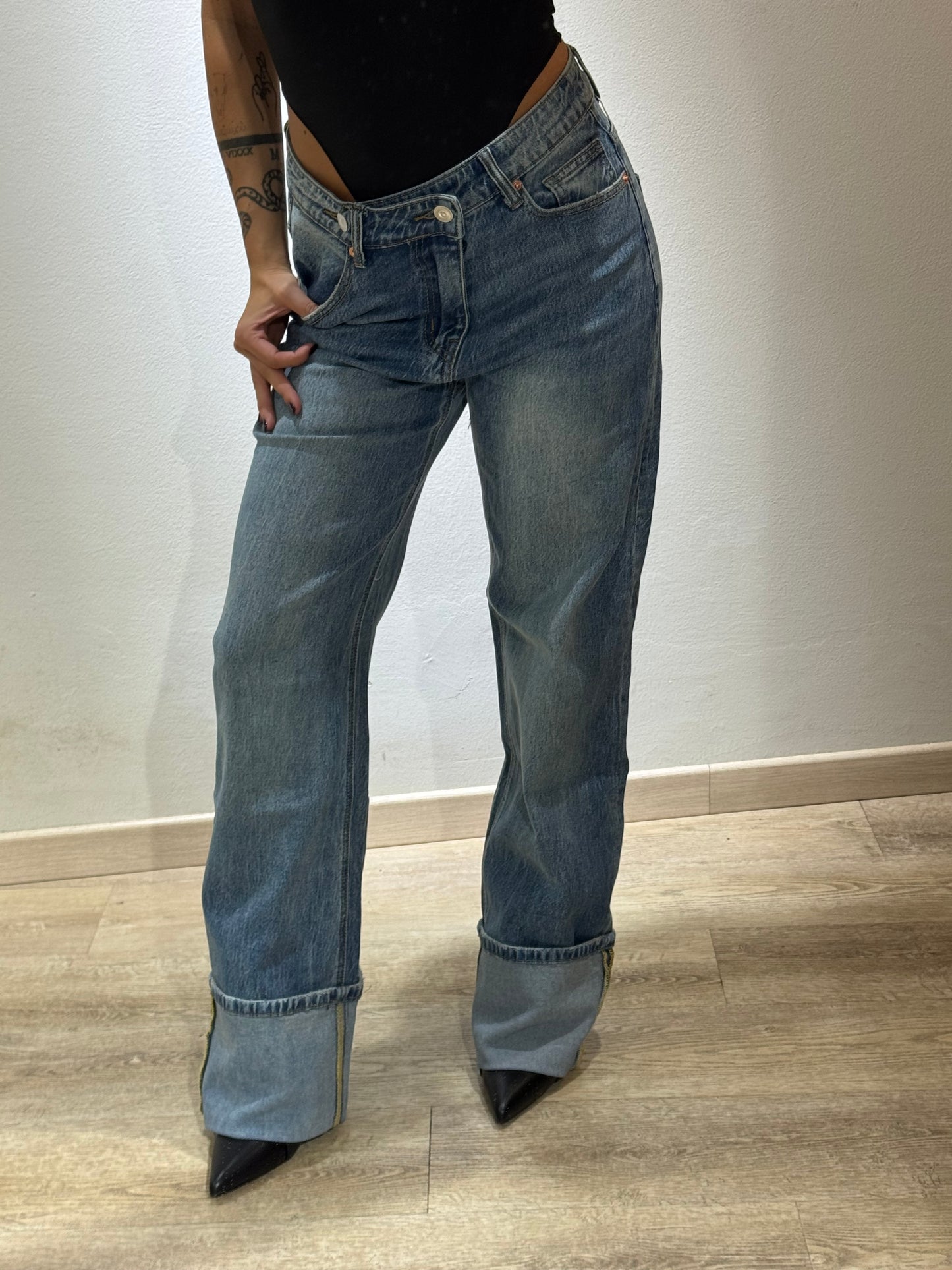 DENIM ASIMMETRICO PIEGONE